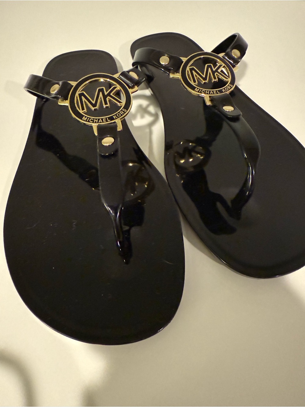 Michael Kors Black Jelly Thong Sandals with Gold MK Emblem